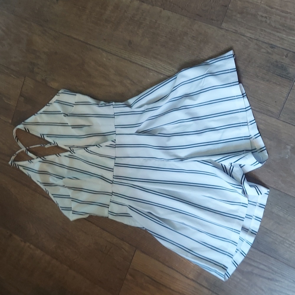 Back zip  halter style romper with adjustable straps size small